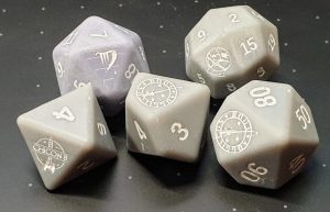 selection of grey polyhedral dice functioning as prototypes