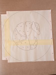 photo of a sketch of an armadillo in a circle on paper