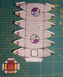 The balloon and gondola of the airship cut out from the pattern sheet.