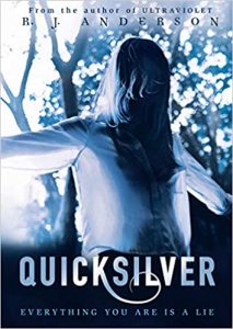 The image shows the cover of R.J Anderson's novel 'Quicksilver'. The whole image is rendered in a blue tonal light, with high levels of light exposure. A figure stands in the centre with their arms outstretched, their long light hair obscures their face. There are trees thought which light filters in the background.