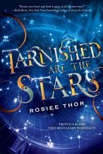 The image shows the cover of Rosiee Thor's Tarnished Are the Stars. Cover is dark blue with lighter blues and white making up the face of a clock, it has roman numerals, it takes up the whole cover and resides in the background. In the foreground the title Tarnished Are the Stars is constructed of clockwork pieces across the centre of the book. 