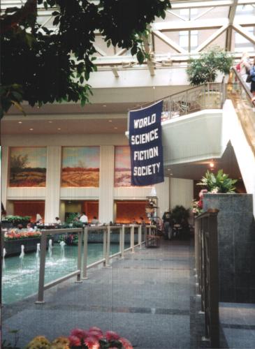 Chicon 2000: the WSFS banner floats over the Hyatt's lobby restaurant
[Photo by Mike Jencevice]